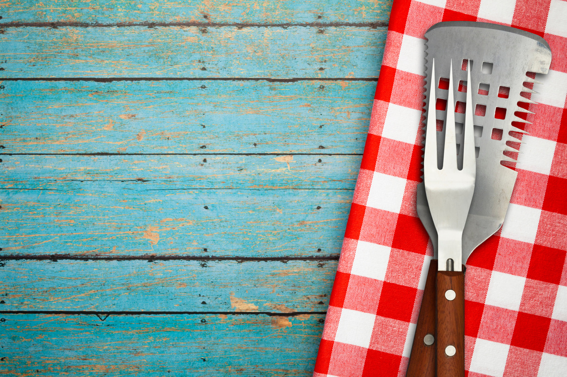 BBQ Utensils on Blue Rustic Picnic Table